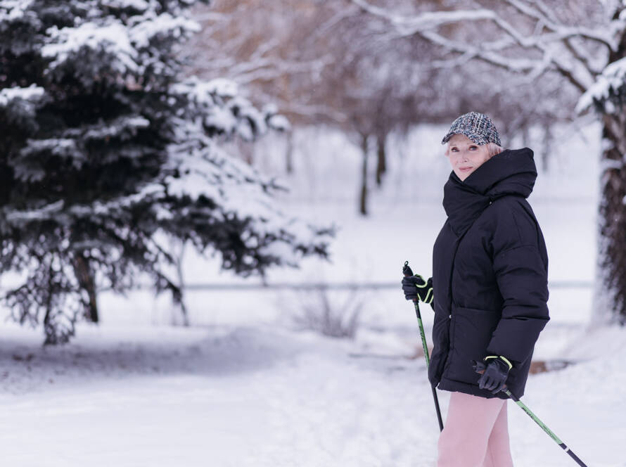Senior woman walking in snow in Southern Illinsoi